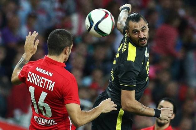 MOSCOW, RUSSIA. AUGUST 29, 2015. Spartak s Salvatore Bocchetti (L) and Anzhi s Hugo Almeida fight for the ball in their 2015 16 Season Russian Premier League Round 7 football match at the Otkrytie Arena Stadium. Stanislav Krasilnikov TASS  TS00BE3B