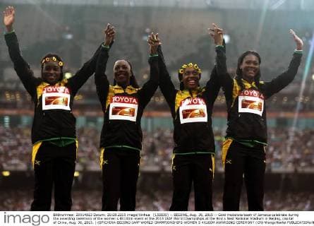 (150830) -- BEIJING, Aug. 30, 2015 -- Gold medalists team of Jamaica celebrate during the awarding ceremony of the women s 4X100m event at the 2015 IAAF World Champships at the Bird s Nest National Stadium in Beijing, capital of China, Aug. 30, 2015. ) (SP)CHINA-BEIJING-IAAF WORLD CHAMPIONSHIPS-WOMEN S 4X100M AWARDING CEREMONY (CN) WangxHaofei 