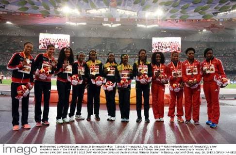 (150830) -- BEIJING, Aug. 30, 2015 -- Gold medalists team of Jamaica (C), silver medalists team of the United States (L) and bronze medalists team of Trinidad and Tobago celebrate during the awarding ceremony of the women s 4X100m event at the 2015 IAAF World Champships at the Bird s Nest National Stadium in Beijing, capital of China, Aug. 30, 2015.) (SP)CHINA-BEIJING-IAAF WORLD CHAMPIONSHIPS-WOMEN S 4X100M AWARDING CEREMONY (CN) WangxHaofei 