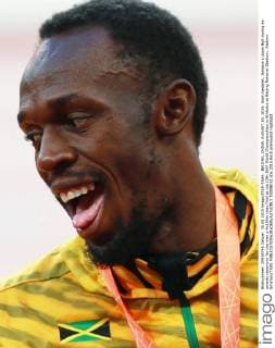 BEIJING, CHINA. AUGUST 30, 2015. Gold medalist, Jamaica s Usain Bolt during an awards ceremony for the men s 4x100m relay final at the 15th IAAF World Championships in Athletics at Beijing National Stadium. Vladimir Smirnov TASS  TS00BF32