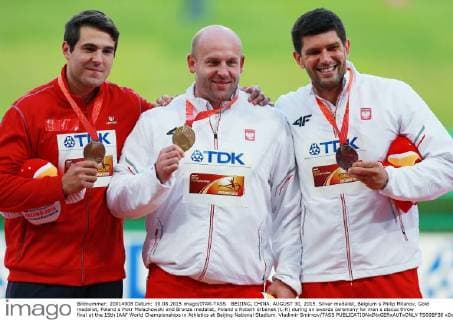 BEIJING, CHINA. AUGUST 30, 2015. Silver medalist, Belgium s Philip Milanov, Gold medalist, Poland s Piotr Malachowski and Bronze medalist, Poland s Robert Urbanek (L-R) during an awards ceremony for men s discus throw final at the 15th IAAF World Championships in Athletics at Beijing National Stadium. Vladimir Smirnov TASS  TS00BF38