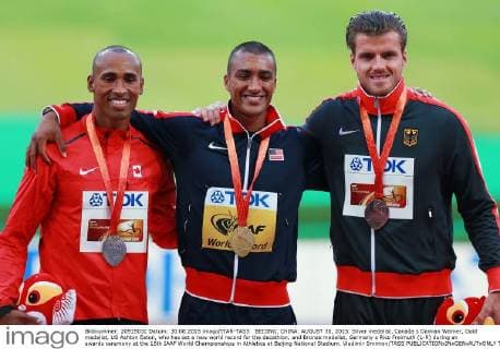 BEIJING, CHINA. AUGUST 30, 2015. Silver medalist, Canada s Damian Warner, Gold medalist, US Ashton Eaton, who has set a new world record for the decathlon, and Bronze medalist, Germany s Rico Freimuth (L-R) during an awards ceremony at the 15th IAAF World Championships in Athletics at Beijing National Stadium. Vladimir Smirnov TASS  TS00BF3A