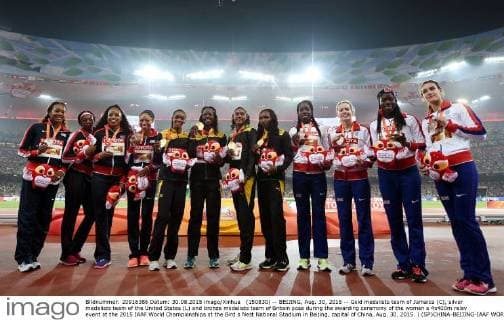 (150830) -- BEIJING, Aug. 30, 2015 -- Gold medalists team of Jamaica (C), silver medalists team of the United States (L) and bronze medalists team of Britain pose during the awarding ceremony of the women s 4x400m relay event at the 2015 IAAF World Championships at the Bird s Nest National Stadium in Beijing, capital of China, Aug. 30, 2015. ) (SP)CHINA-BEIJING-IAAF WORLD CHAMPIONSHIPS-WOMEN S 4X400M RELAY AWARDING CEREMONY (CN) YuexYuewei 