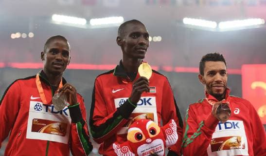 (150830) -- BEIJING, Aug. 30, 2015 -- Gold medalist Kenya s Asbel Kiprop (C), silver medalist Kenya s Elijah Motonei Manangoi (L) and bronze medalist Morocco s Abdalaati Iguider pose during the awarding ceremony of the men s 1500m event at the 2015 IAAF World Championships at the Bird s Nest National Stadium in Beijing, capital of China, Aug. 30, 2015. ) (SP)CHINA-BEIJING-IAAF WORLD CHAMPIONSHIPS-MEN S 1500M AWARDING CEREMONY (CN) YuexYuewei 