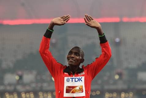 (150830) -- BEIJING, Aug. 30, 2015 -- Gold medalist Kenya s Asbel Kiprop greets the spectators during the awarding ceremony of the men s 1500m event at the 2015 IAAF World Championships at the Bird s Nest National Stadium in Beijing, capital of China, Aug. 30, 2015. ) (SP)CHINA-BEIJING-IAAF WORLD CHAMPIONSHIPS-MEN S 1500M AWARDING CEREMONY (CN) YuexYuewei 