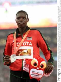 (150830) -- BEIJING, Aug. 30, 2015 -- Silver medalist Kenya s Helah Kiprop poses during the awarding ceremony of the women s marathon event at the 2015 IAAF World Championships at the Bird s Nest National Stadium in Beijing, capital of China, Aug. 30, 2015. ) (SP)CHINA-BEIJING-IAAF WORLD CHAMPIONSHIPS-WOMEN S MARATHON AWARDING CEREMONY (CN) YuexYuewei 