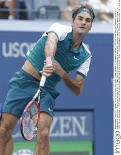 Roger Federer of Switzerland serves in his first round match to Leonardo Mayer of Argentina in Arthur Ashe Stadium on day two at the US Open Tennis Championships at the USTA Billie Jean King National Tennis Center in New York City on September 1, 2015.  NYP20150901102 JOHNxANGELILLO
