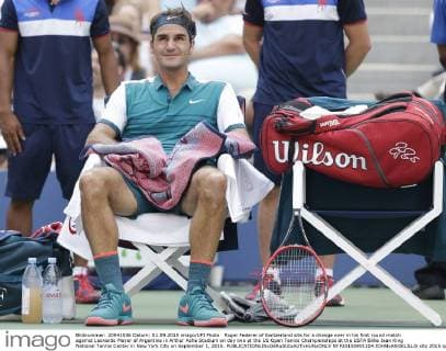 Roger Federer of Switzerland sits for a change over in his first round match against Leonardo Mayer of Argentina in Arthur Ashe Stadium on day two at the US Open Tennis Championships at the USTA Billie Jean King National Tennis Center in New York City on September 1, 2015.  NYP20150901104 JOHNxANGELILLO