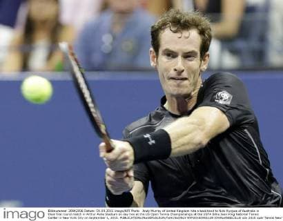 Andy Murray of United Kingdom hits a backhand to Nick Kyrgios of Australia in their first round match in Arthur Ashe Stadium on day two at the US Open Tennis Championships at the USTA Billie Jean King National Tennis Center in New York City on September 1, 2015.  NYP20150901129 JOHNxANGELILLO
