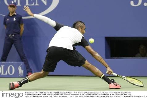 Nick Kyrgios of Australia reaches to return a ball to Andy Murray of United Kingdom in their first round match in Arthur Ashe Stadium on day two at the US Open Tennis Championships at the USTA Billie Jean King National Tennis Center in New York City on September 1, 2015.  NYP20150901133 JOHNxANGELILLO