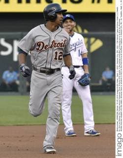 Sept. 1, 2015 - Kansas City, MO, USA - The Detroit Tigers Anthony Gose (12) heads for third as Kansas City Royals second baseman Omar Infante (14) laughs in the background after a throwing error to first by shortstop Alcides Escobar skipped into the seats, allowing Gose to advance to third in the first inning at Kauffman Stadium in Kansas City, Mo., on Tuesday, Sept. 1, 2015. Detroit at Kansas City - ZUMAm67_