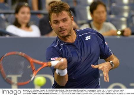 Stan Wawrinka of Switzerland competes during the men s singles first round match against Albert Ramos-Vinolas of Spain at the 2015 US Open Tennis Tournament in New York, the United States, Sept. 1, 2015. Wawrinka was qualified for the next round after beating Vinolas 3-0. ) (SP)US-NEW YORK-TENNIS-US OPEN-MEN S SINGLES-FIRST ROUND WangxLei 
