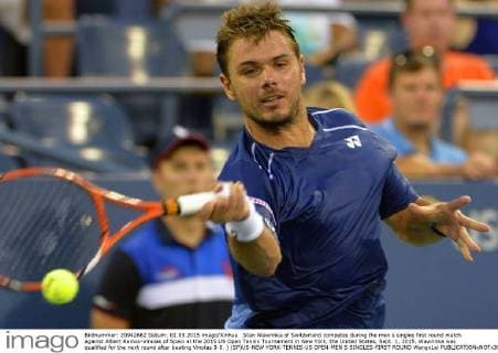 Stan Wawrinka of Switzerland competes during the men s singles first round match against Albert Ramos-Vinolas of Spain at the 2015 US Open Tennis Tournament in New York, the United States, Sept. 1, 2015. Wawrinka was qualified for the next round after beating Vinolas 3-0. ) (SP)US-NEW YORK-TENNIS-US OPEN-MEN S SINGLES-FIRST ROUND WangxLei 