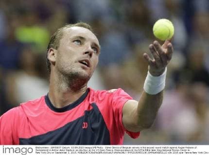 Steve Darcis of Belgium serves in his second round match against Roger Federer of Switzerland in Arthur Ashe Stadium on day four at the US Open Tennis Championships at the USTA Billie Jean King National Tennis Center in New York City on September 3, 2015.  NYP20150903136 JOHNxANGELILLO