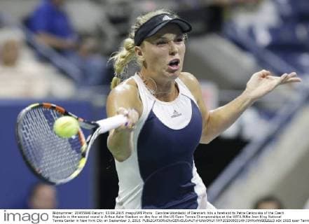 Caroline Wozniacki of Denmark hits a forehand to Petra Cetkovska of the Czech Republic in the second round in Arthur Ashe Stadium on day four at the US Open Tennis Championships at the USTA Billie Jean King National Tennis Center in New York City on September 3, 2015.  NYP20150903149 JOHNxANGELILLO