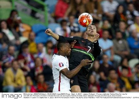 Sept. 4, 2015 - Lisbon, Portugal - France s defender Patrice Evra (L) vies for the ball with Portugal s forward Cristiano Ronaldo (R) during the friendly football match between Portugal and France at Jose Alvalade Stadium in Lisbon on September 4, 2015. NURPHOTO CARLOS PALMA. FBL-EURO-2016-FRIENDLY-POR-FRA  - ZUMAn230