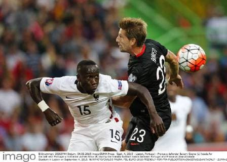 Sept. 4, 2015 - Lisbon, Portugal - France s defender Bacary Sagna (L) heads for the ball with Portugal s midfielder Adrien Silva (R) during the friendly football match between Portugal and France at Jose Alvalade Stadium in Lisbon on September 4, 2015. NURPHOTO CARLOS PALMA. FBL-EURO-2016-FRIENDLY-POR-FRA  - ZUMAn230