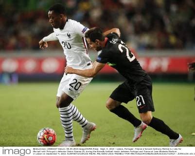 Sept. 4, 2015 - Lisbon, Portugal - France s forward Anthony Martial (L) vies for the ball with Portugal s defender Cedric Soares (R) during the friendly football match between Portugal and France at Jose Alvalade Stadium in Lisbon on September 4, 2015. NURPHOTO CARLOS PALMA. FBL-EURO-2016-FRIENDLY-POR-FRA  - ZUMAn230