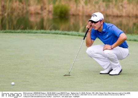 September 4, 2015; Norton, MA, USA; Sang-Moon Bae lines up a putt at the 16th hole during the first round of the Deutsche Bank Championship at TPC Boston. PGA Golf Herren 2015: Deutsche Bank Championship SEP 04 - ZUMAc04_