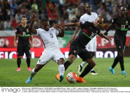 Sept. 4, 2015 - Lisbon, Portugal - Portugals midfielder Joo Mrio vies with Frances defender Evra during the friendly football match between Portugal and France at Alvalade stadium in Lisbon, Portugal on September 4, 2015. UEFA Euro2016, Friendly Match Portugal Vs France  - ZUMAn230