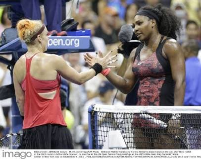 Bethanie Mattek-Sands and Serena Williams shake hands at the net after their match in the third round in Arthur Ashe Stadium on day five at the US Open Tennis Championships at the USTA Billie Jean King National Tennis Center in New York City on September 4, 2015. .  NYP20150904136 JOHNxANGELILLO