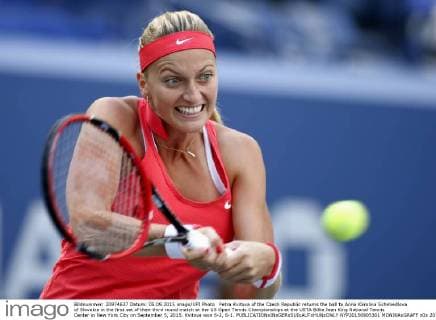 Petra Kvitova of the Czech Republic returns the ball to Anna Karolina Schmiedlova of Slovakia in the first set of their third round match at the US Open Tennis Championships at the USTA Billie Jean King National Tennis Center in New York City on September 5, 2015. Kvitova won 6-2, 6-1.  NYP20150905301 MONIKAxGRAFF