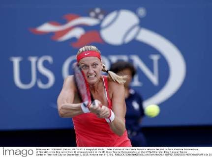 Petra Kvitova of the Czech Republic returns the ball to Anna Karolina Schmiedlova of Slovakia in the first set of their third round match at the US Open Tennis Championships at the USTA Billie Jean King National Tennis Center in New York City on September 5, 2015. Kvitova won 6-2, 6-1.  NYP20150905305 MONIKAxGRAFF