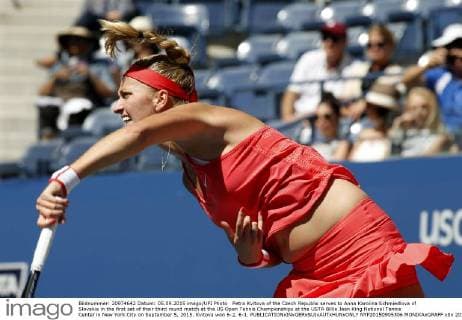 Petra Kvitova of the Czech Republic serves to Anna Karolina Schmiedlova of Slovakia in the first set of their third round match at the US Open Tennis Championships at the USTA Billie Jean King National Tennis Center in New York City on September 5, 2015. Kvitova won 6-2, 6-1.  NYP20150905306 MONIKAxGRAFF
