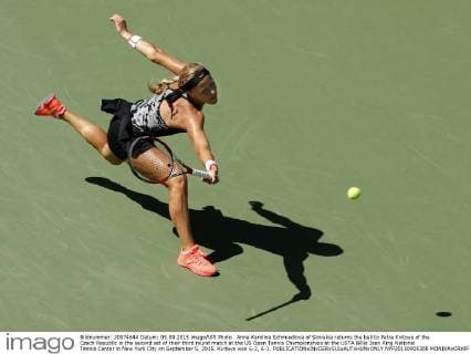 Anna Karolina Schmiedlova of Slovakia returns the ball to Petra Kvitova of the Czech Republic in the second set of their third round match at the US Open Tennis Championships at the USTA Billie Jean King National Tennis Center in New York City on September 5, 2015. Kvitova won 6-2, 6-1.  NYP20150905308 MONIKAxGRAFF