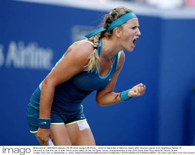 Victoria Azarenka of Belarus reacts after wining a game from Angelique Kerber of Germany in the first set of their third round match at the US Open Tennis Championships at the USTA Billie Jean King National Tennis Center in New York City on September 5, 2015.  NYP20150905329 MONIKAxGRAFF