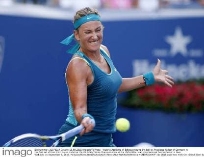 Victoria Azarenka of Belarus returns the ball to Angelique Kerber of Germany in the first set of their third round match at the US Open Tennis Championships at the USTA Billie Jean King National Tennis Center in New York City on September 5, 2015.  NYP20150905331 MONIKAxGRAFF