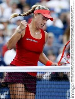 Angelique Kerber of Germany reacts after wining a game from Victoria Azarenka of Belarus in the first set of their third round match at the US Open Tennis Championships at the USTA Billie Jean King National Tennis Center in New York City on September 5, 2015.  NYP20150905333 MONIKAxGRAFF