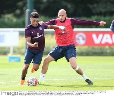England s Alex Oxlade-Chamberlain and Jonjo Shelvey in action during training Euro 2016 Qualifying - Tottenham Hotspur Training Centre - England - 7th September 2015 - Picture David Klein Sportimage EDITORIAL USE ONLY. No use with unauthorised audio, video, data, fixture lists, club league logos or live services. Online in-match use limited to 120 images, no video emulation. No use in betting, games or single club league player publications.