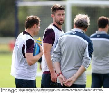 England s Roy Hodgson talks to Gary Cahill during training Euro 2016 Qualifying - Tottenham Hotspur Training Centre - England - 7th September 2015 - Picture David Klein Sportimage EDITORIAL USE ONLY. No use with unauthorised audio, video, data, fixture lists, club league logos or live services. Online in-match use limited to 120 images, no video emulation. No use in betting, games or single club league player publications.