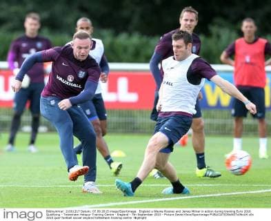 England s Wayne Rooney and James Milner in action during training Euro 2016 Qualifying - Tottenham Hotspur Training Centre - England - 7th September 2015 - Picture David Klein Sportimage EDITORIAL USE ONLY. No use with unauthorised audio, video, data, fixture lists, club league logos or live services. Online in-match use limited to 120 images, no video emulation. No use in betting, games or single club league player publications.