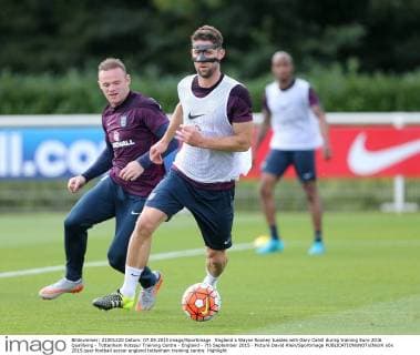 England s Wayne Rooney tussles with Gary Cahill during training Euro 2016 Qualifying - Tottenham Hotspur Training Centre - England - 7th September 2015 - Picture David Klein Sportimage EDITORIAL USE ONLY. No use with unauthorised audio, video, data, fixture lists, club league logos or live services. Online in-match use limited to 120 images, no video emulation. No use in betting, games or single club league player publications.