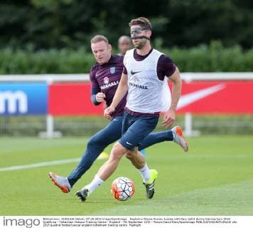 England s Wayne Rooney tussles with Gary Cahill during training Euro 2016 Qualifying - Tottenham Hotspur Training Centre - England - 7th September 2015 - Picture David Klein Sportimage EDITORIAL USE ONLY. No use with unauthorised audio, video, data, fixture lists, club league logos or live services. Online in-match use limited to 120 images, no video emulation. No use in betting, games or single club league player publications.
