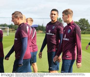 England s Chris Smalling with John Stones during training Euro 2016 Qualifying - Tottenham Hotspur Training Centre - England - 7th September 2015 - Picture David Klein Sportimage EDITORIAL USE ONLY. No use with unauthorised audio, video, data, fixture lists, club league logos or live services. Online in-match use limited to 120 images, no video emulation. No use in betting, games or single club league player publications.