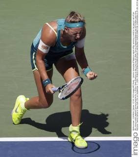 Victoria Azarenka of Belarus reacts after winning a point in the second set of her 4th round match against Varvara Lepchenko in Arthur Ashe Stadium on day 8 at the US Open Tennis Championships at the USTA Billie Jean King National Tennis Center in New York City on September 7, 2015.  NYP20150907106 JOHNxANGELILLO