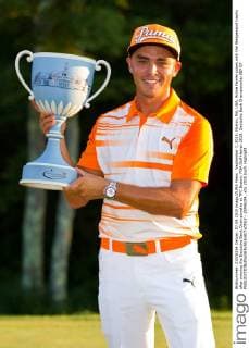 September 7, 2015; Norton, MA, USA; Rickie Fowler poses with the Wedgewood trophy after winning the Deutsche Bank Championship at TPC Boston. PGA Golf Herren 2015: Deutsche Bank Championship SEP 07 - ZUMAc04_