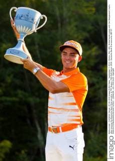 September 7, 2015; Norton, MA, USA; Rickie Fowler poses with the Wedgewood trophy after winning the Deutsche Bank Championship at TPC Boston. PGA Golf Herren 2015: Deutsche Bank Championship SEP 07 - ZUMAc04_