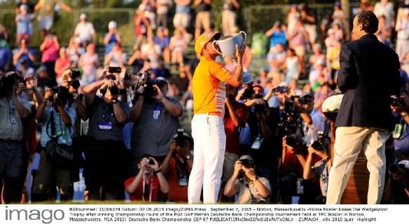 September 7, 2015 - Norton, Massachusetts -Rickie Fowler kisses the Wedgewood Trophy after winning championship round of the PGA Golf Herren Deutsche Bank Championship tournament held at TPC Boston in Norton, Massachusetts. PGA 2015: Deutsche Bank Championship SEP 07 - ZUMAc04_