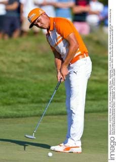 September 7, 2015; Norton, MA, USA; Rickie Fowler putts at the 10th hole during the final round of the Deutsche Bank Championship at TPC Boston. PGA Golf Herren 2015: Deutsche Bank Championship SEP 07 - ZUMAc04_