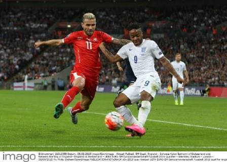 Aktuell Fußball, EM Quali, England - Schweiz Valon Behrami of Switzerland and Raheem Sterling of England - England vs Switzerland - UEFA EURO EM Europameisterschaft Fussball 2016 Qualifier - Wembley Stadium - London - 08 09 2015 Pic Philip Oldham SportImage EDITORIAL USE ONLY. No use with unauthorised audio, video, data, fixture lists, club league logos or live services. Online in-match use limited to 120 images, no video emulation. No use in betting, games or single club league player publications.