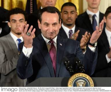 Duke head basketball coach Mike Krzyzewski asks everyone to stand to honor President Barack Obama during a celebration event in the East Room of the White House in Washington, DC on September 8, 2015. The Duke Blue Devils won the NCAA College League USA college basketball championship in March of 2015.  WAP2015090805 PATxBENIC