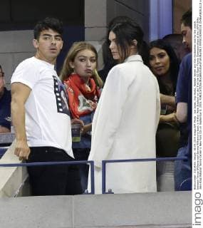 Joe Jonas, Gigi Hadid, Kendall Jenner and Kim Kardashian wait for the match between Venus Williams and Serena Williams to start in Arthur Ashe Stadium on day 9 at the US Open Tennis Championships at the USTA Billie Jean King National Tennis Center in New York City on September 8, 2015.  NYP20150908110 JOHNxANGELILLO