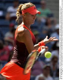 (150909) -- NEW YORK, Sept. 8, 2015 -- Kristina Mladenovic of France hits a return during the women s singles quarter-final match against Roberta Vinci of Italy at the 2015 US Open in New York, the United States, on Sept. 8, 2015. Kristina Mladenovic lost 1-2. ) (SP)US-NEW YORK-TENNIS-US OPEN WangxLei 