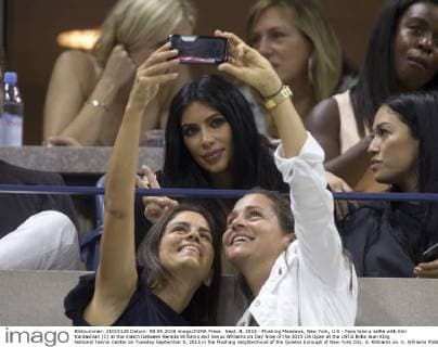 Sept. 8, 2015 - Flushing Meadows, New York, U.S - Fans take a selfie with Kim Kardashian (C) at the match between Serena Williams and Venus Williams on Day Nine of the 2015 US Open at the USTA Billie Jean King National Tennis Center on Tuesday September 8, 2015 in the Flushing neighborhood of the Queens borough of New York City. S. Williams vs. V. Williams - ZUMAp124
