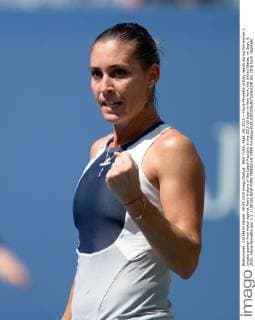 NEW YORK, Sept. 09, 2015 -- Flavia Pennetta of Italy reacts during the women s singles quarter-final match against Petra Kvitova of the Czech Republic at the 2015 US Open in New York, the United States, on Sept. 9, 2015. Flavia Pennetta won 2-1. ) (SP)US-NEW YORK-TENNIS-US OPEN YinxBogu 