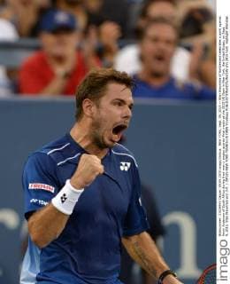 NEW YORK, Sept. 09, 2015 -- Stan Wawrinka of Switzerland celebrates a point against Kevin Anderson of South Africa during their men s singles quarter-final match at the 2015 US Open in New York, the United States, on Sept. 9, 2015. Stan Wawrinka won 3-0. ) (SP)US-NEW YORK-TENNIS-US OPEN YinxBogu 